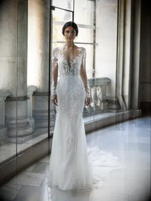Illusion long sleeve gown with beading