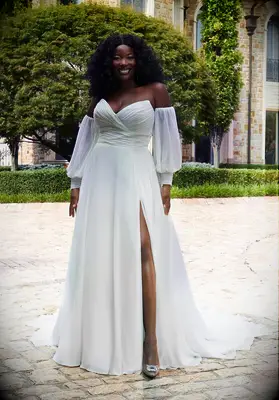 Bride wearing white, off the shoulder chiffon wedding gown