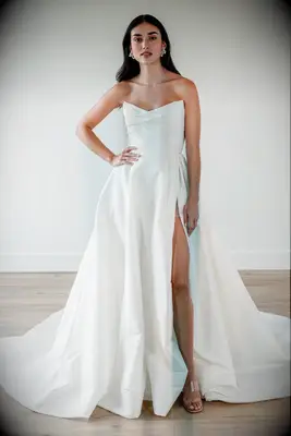 Bride wearing a white strapless dupioni wedding gown