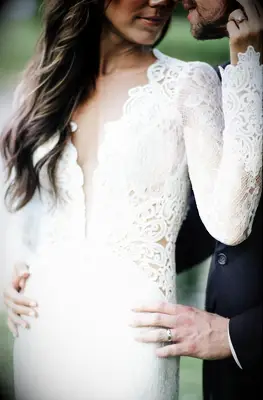 Plunging neckline with lace details and cutouts