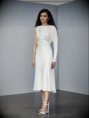 Silk draped bodice with one long sleeve and tea length skirt