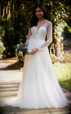 Illusion long sleeves and tulle skirt with pearl detailing