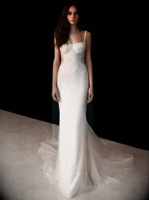 Fitted gown with pearl embellishments and sequins