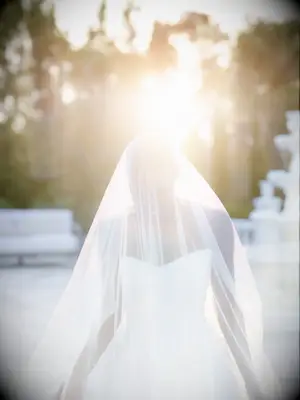 Bride with long wedding veil 