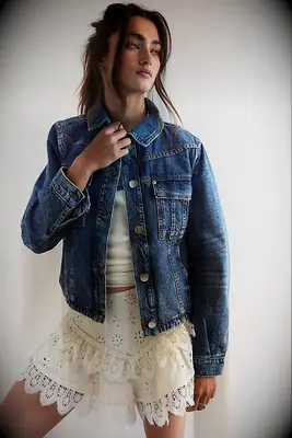 Woman wearing a denim jacket