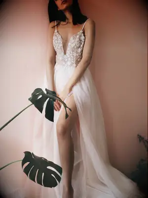 Plunging neckline with star embellishments and tulle skirt