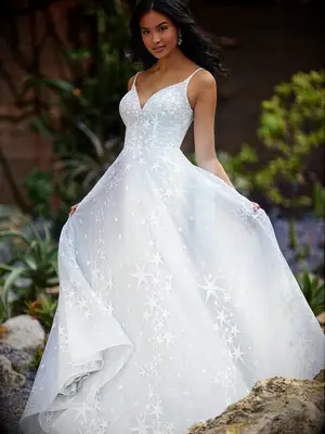 A-line tulle and lace light blue gown with white star appliqué and sweetheart neckline