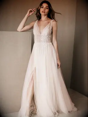 Tulle skirt with slit and pearl beading on bodice in blush