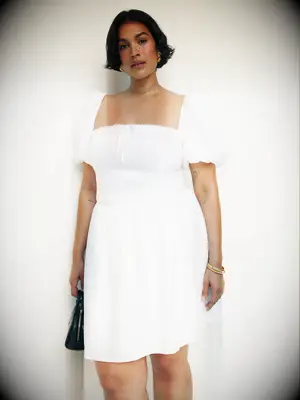 Short white puff shoulder dress