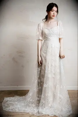 A-line wedding dress with floral tulle and puffed sleeves