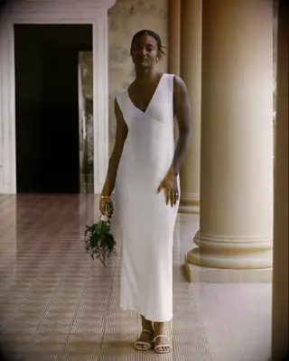 Plunge neck wedding dress with cowl back