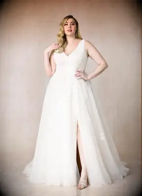 Plus size wedding dress with leg slit