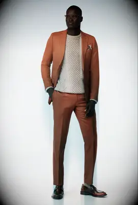 Indochino rust fall wedding guest suit