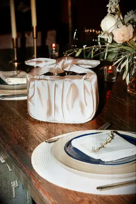 white purse on table