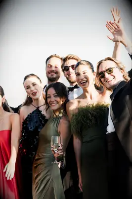 Guests at vineyard wedding wearing formal attire