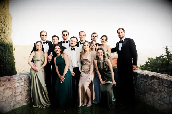 Guests at vineyard wedding wearing formal attire