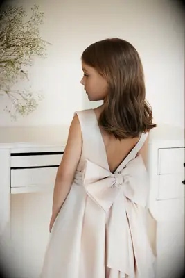 satin dress with v back and large bow