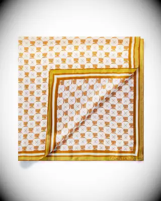 Printed silk scarf by Dandy Del Mar. 