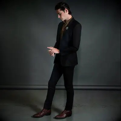 Snakeskin 70s-inspired boots by Straight to Hell Apparel. 