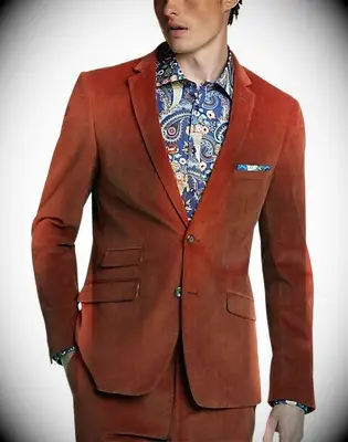 Amber suit with a paisley shirt underneath from Men