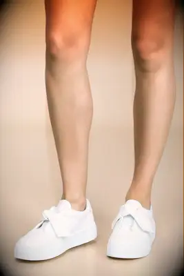 White bridal sneakers with bows