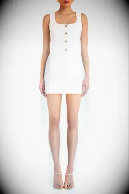 Amanda Uprichard ivory romper for Vegas wedding