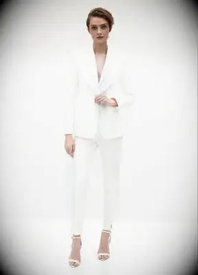SuitShop white tuxedo Vegas wedding outfit