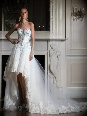 Sleeveless ball gown with long train and lace and embellishment details