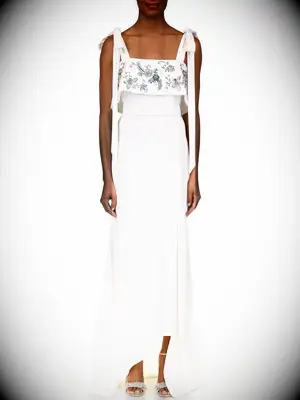 Subtle high-low, tie straps and black floral embroidery on top