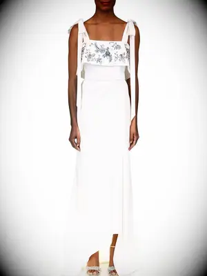 Tie bow shoulders and embellished flowers on bodice with subtle high-low skirt