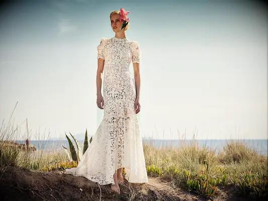 Lace dress with subtle high to low skirt and short sleeves