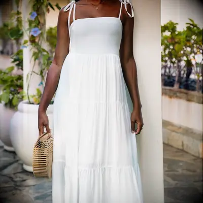 Airy long white summer dress with square neckline and tie shoulder straps