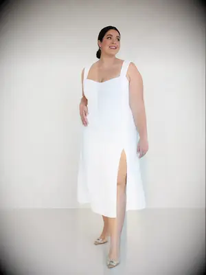 Minimalistic midi white dress with leg slit