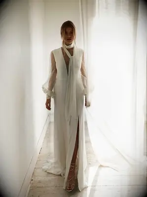 Model poses in wedding gown