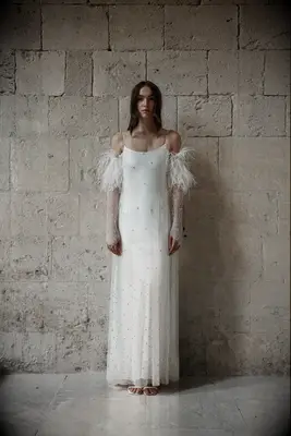 Model poses in wedding gown