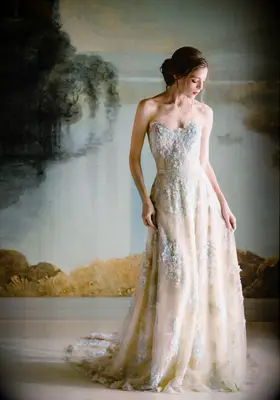 Model poses in wedding gown