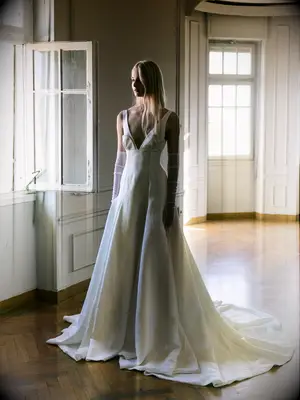 Model poses in wedding gown