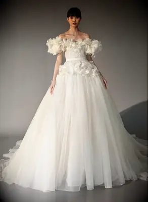 Model poses in wedding gown