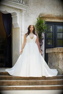 Model poses in wedding gown