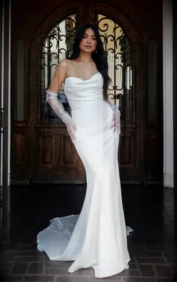 Model poses in wedding gown