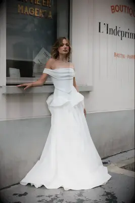 Model poses in wedding gown