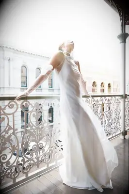 Model poses in wedding gown