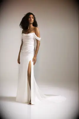 Model poses in wedding gown