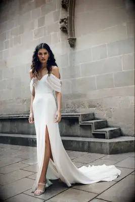 Model poses in wedding gown