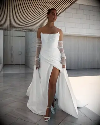 Model poses in wedding gown