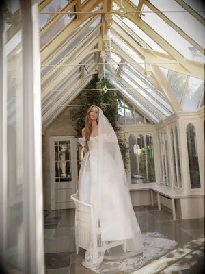 Model poses in wedding gown