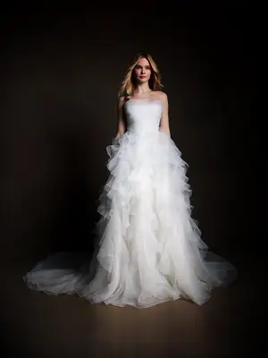 Model poses in wedding gown