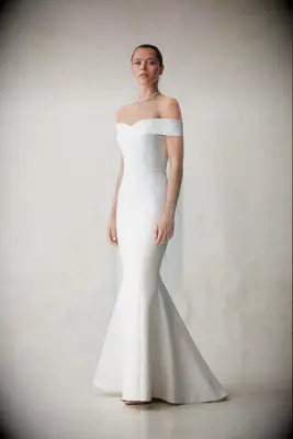 Model poses in wedding gown