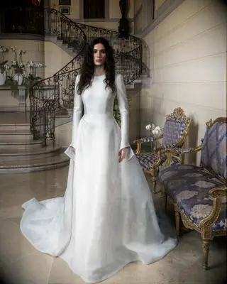 Model poses in wedding gown