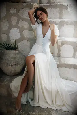 Model poses in wedding gown